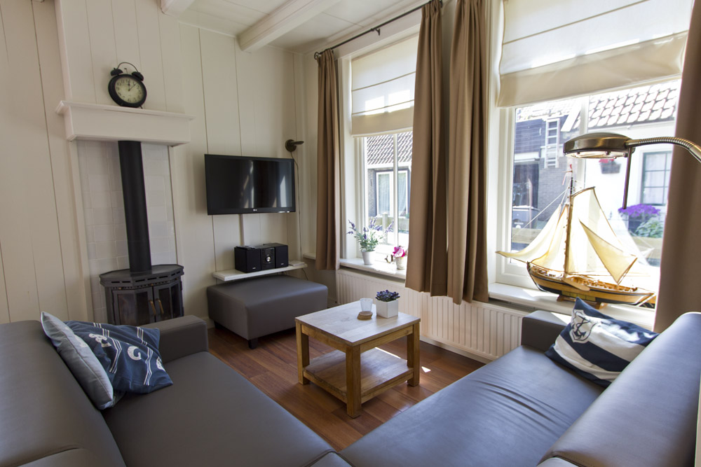 Een zespersoons appartement in midsland terschelling Woonkamer zithoek hoekbank